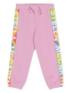 Stella McCartney Kids pantalon de jogging fuselé à logo imprimé - Rose