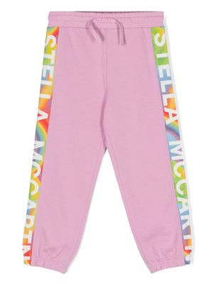 Stella McCartney Kids pantalon de jogging fuselé à logo imprimé - Rose