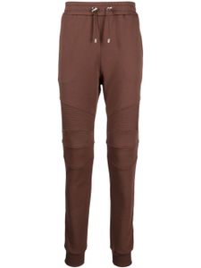 Balmain pantalon de jogging à logo imprimé - Marron