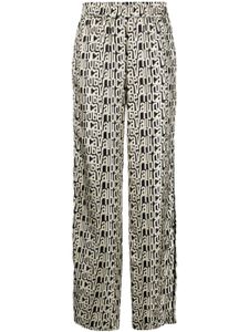 Roberto Cavalli pantalon en soie à motif monogrammé - Noir