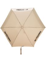 Moschino parapluie compact à logo imprimé - Tons neutres