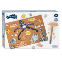 Small Foot hamertje tik oceaan