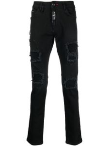 Philipp Plein jean slim à finitions effilochées - Noir