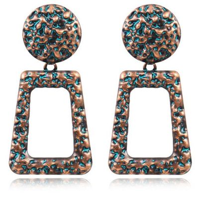 Dames oorbellen of oorhangers bruin rond en rechthoekig