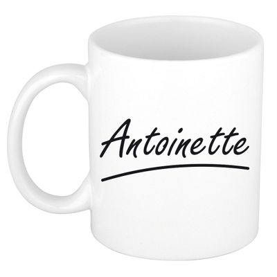 Naam cadeau mok / beker Antoinette met sierlijke letters 300 ml