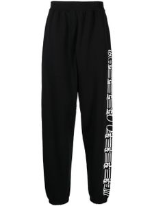 Aries pantalon de jogging en coton à logo imprimé - Noir