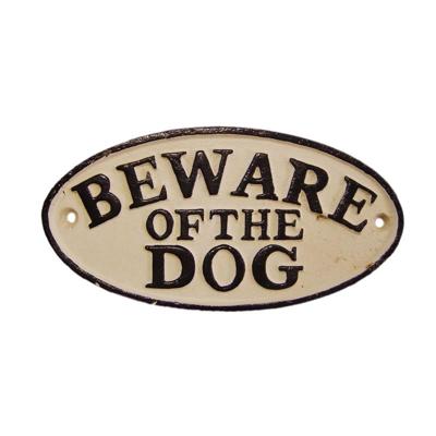 A CAST IRON "BEWARE OF THE DOG" PLAQUE