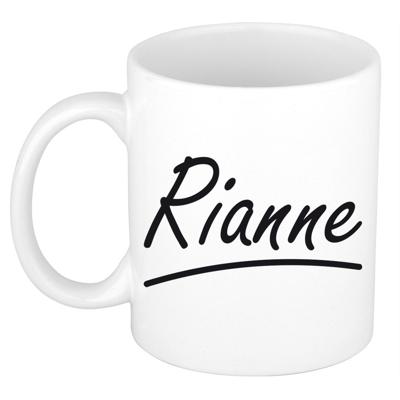 Rianne Naam koffiemok - beker - met sierlijke letters - wit - 300 ml - Cadeau - Dames Rianne Naam koffiemok - beker - met sierlijke letters - wit - 300 ml - Cadeau - Dames