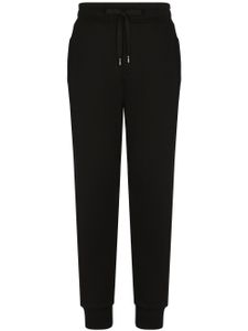 Dolce & Gabbana pantalon de jogging à logo DG - Noir