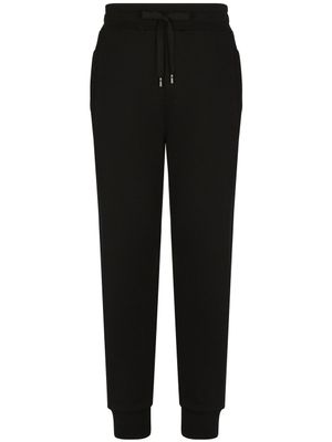 Dolce & Gabbana pantalon de jogging à logo DG - Noir