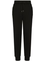 Dolce & Gabbana pantalon de jogging à logo DG - Noir