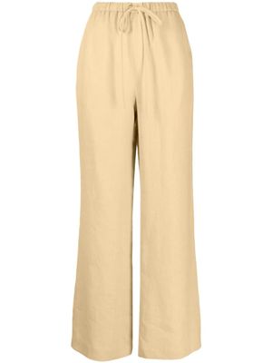 Nanushka pantalon en lin à lien de resserrage - Jaune
