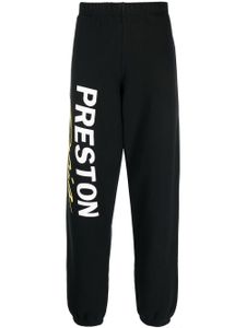 Heron Preston pantalon de jogging en coton biologique à logo imprimé - Noir