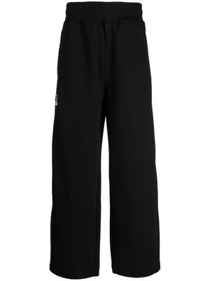izzue pantalon ample à logo appliqué - Noir