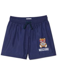 Moschino Kids short de bain à motif graphique - Bleu