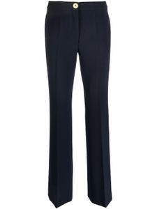 Moschino pantalon droit à boutons embossés - Bleu