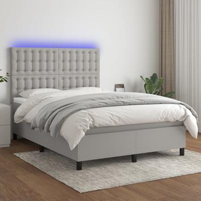Boxspring met matras en LED stof lichtgrijs 140x190 cm