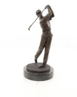 A BRONZE SCULPTURE OF A GOLFER