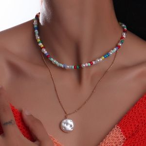 Kleurrijke Kralenketting en Goudkleurige Ketting met Parelhanger - Sieraden - Spiritueelboek.nl