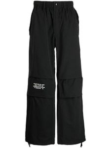 AAPE BY *A BATHING APE® pantalon de jogging à logo imprimé - Noir