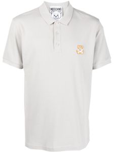 Moschino polo à détail brodé - Gris