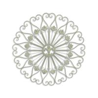 AN IRON FLEUR DE LIS WALL DECOR