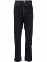 Brunello Cucinelli jean à coupe slim - Noir Brunello Cucinelli jean à coupe slim - Noir