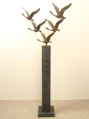 5 bronzen zwanen