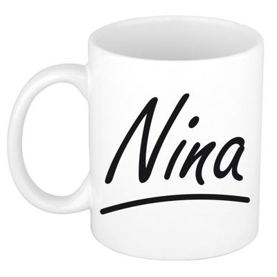 Nina Naam koffiemok - beker - met sierlijke letters - wit - 300 ml - Cadeau - Dames Nina Naam koffiemok - beker - met sierlijke letters - wit - 300 ml - Cadeau - Dames