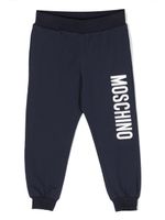 Moschino Kids pantalon de jogging en coton stretch à logo imprimé - Bleu