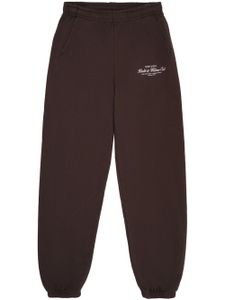 Sporty & Rich pantalon de jogging à logo imprimé - Marron