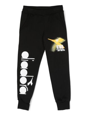 Diadora Junior pantalon de jogging à logo imprimé - Noir
