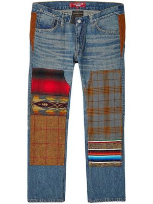 Junya Watanabe MAN jean à design patchwork - Bleu