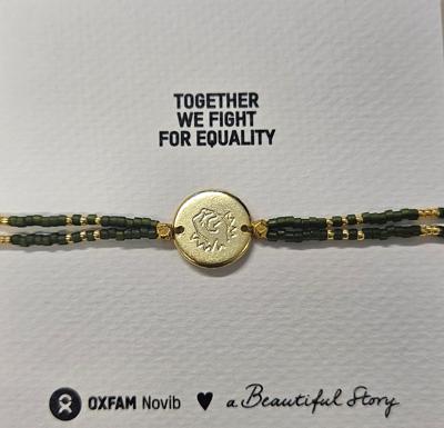 Kralenarmbandje met gouden muntje