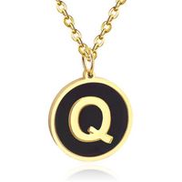 Goudkleurige Dames Schakelketting met Zwarte Kettinghanger Letter Q