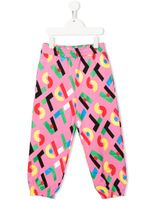 Stella McCartney Kids pantalon de jogging à logo imprimé - Rose