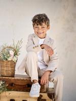 Feestelijke jongensset met overhemd met maokraag en broek beige Feestelijke jongensset met overhemd met maokraag en broek beige