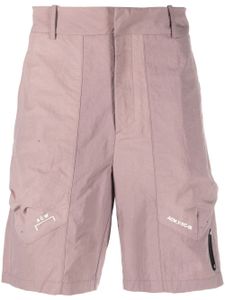 A-COLD-WALL* short Irregular Dye à logo imprimé - Violet