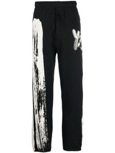 Y-3 pantalon de jogging à logo imprimé - Noir