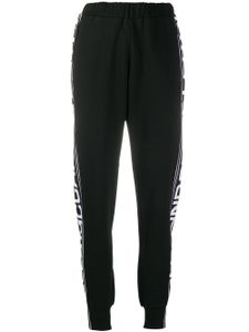 Stella McCartney pantalon de jogging à bandes logo - Noir