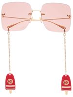 Gucci Eyewear lunettes de soleil à monture oversize - Or