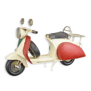 A TIN MODEL OF A SCOOTER