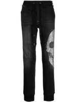 Philipp Plein pantalon de jogging à tête de mort strassée - Noir