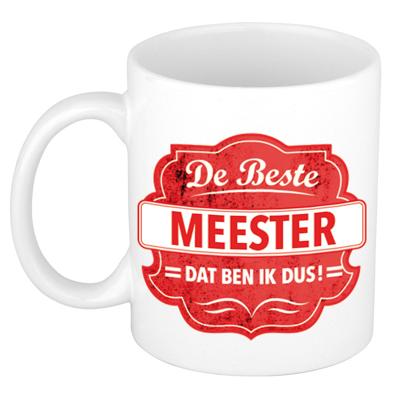 Bellatio Decorations De beste meester koffiemok - cadeau beker - wit - rood embleem - 300 ml