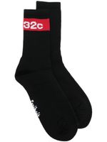 032c chaussettes en maille à logo imprimé - Noir