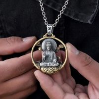 Boeddha amulet uit Tibet - Tibetaanse sieraden - Spiritueelboek.nl