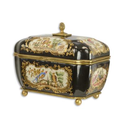 A BRONZE MOUNTED PORCELAIN TEA CADDY