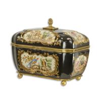 A BRONZE MOUNTED PORCELAIN TEA CADDY