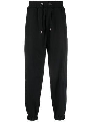 Balmain pantalon de jogging Fluid en coton - Noir