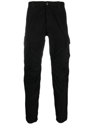 C.P. Company pantalon fuselé à plaque logo - Noir